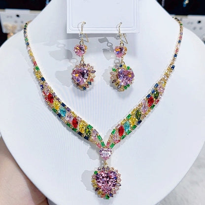 💖 Conjunto de colar e brincos com corações brilhantes – elegância e charme para qualquer ocasião! ✨